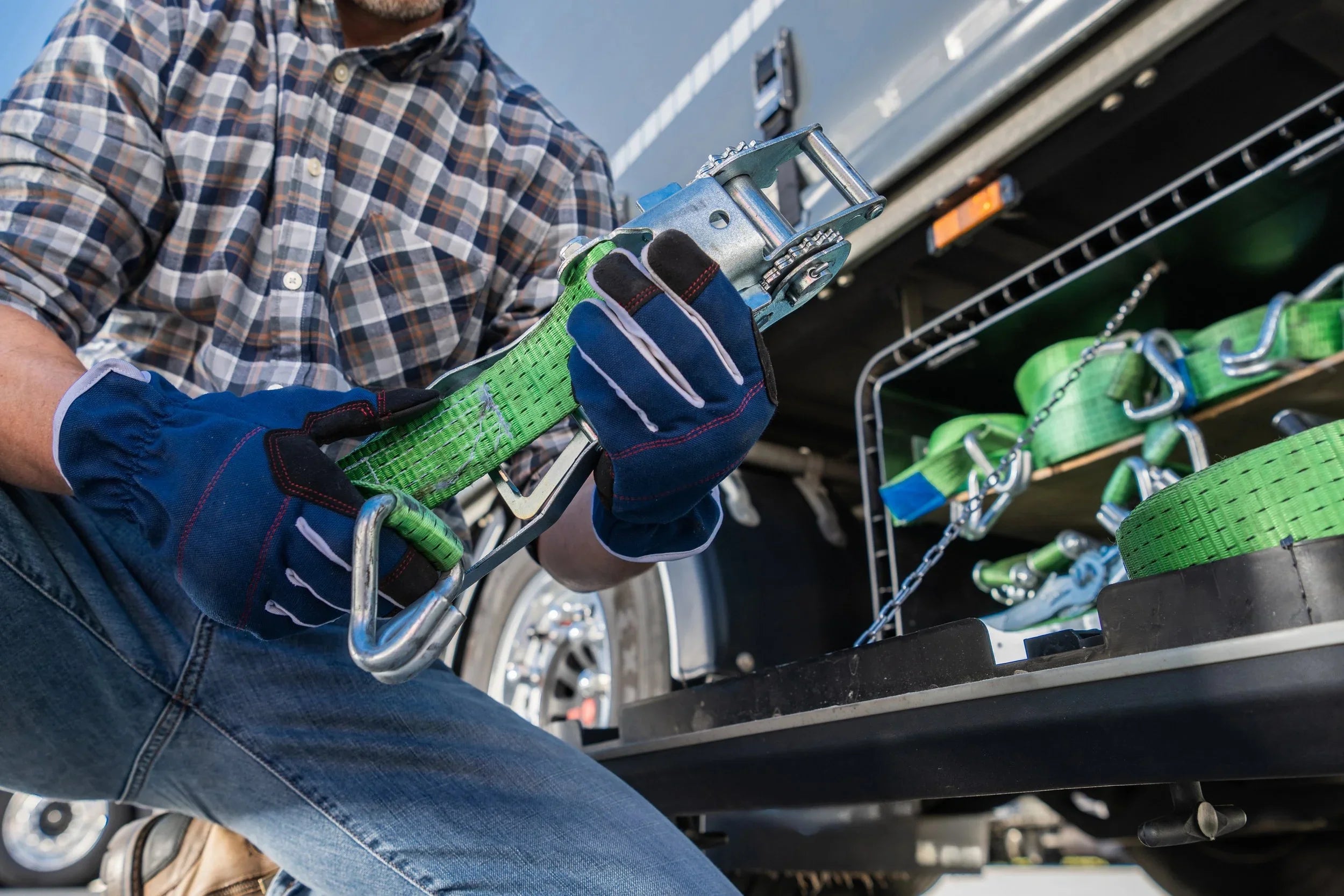 Ratchet straps securing cargo on a truck bed for safe hauling
