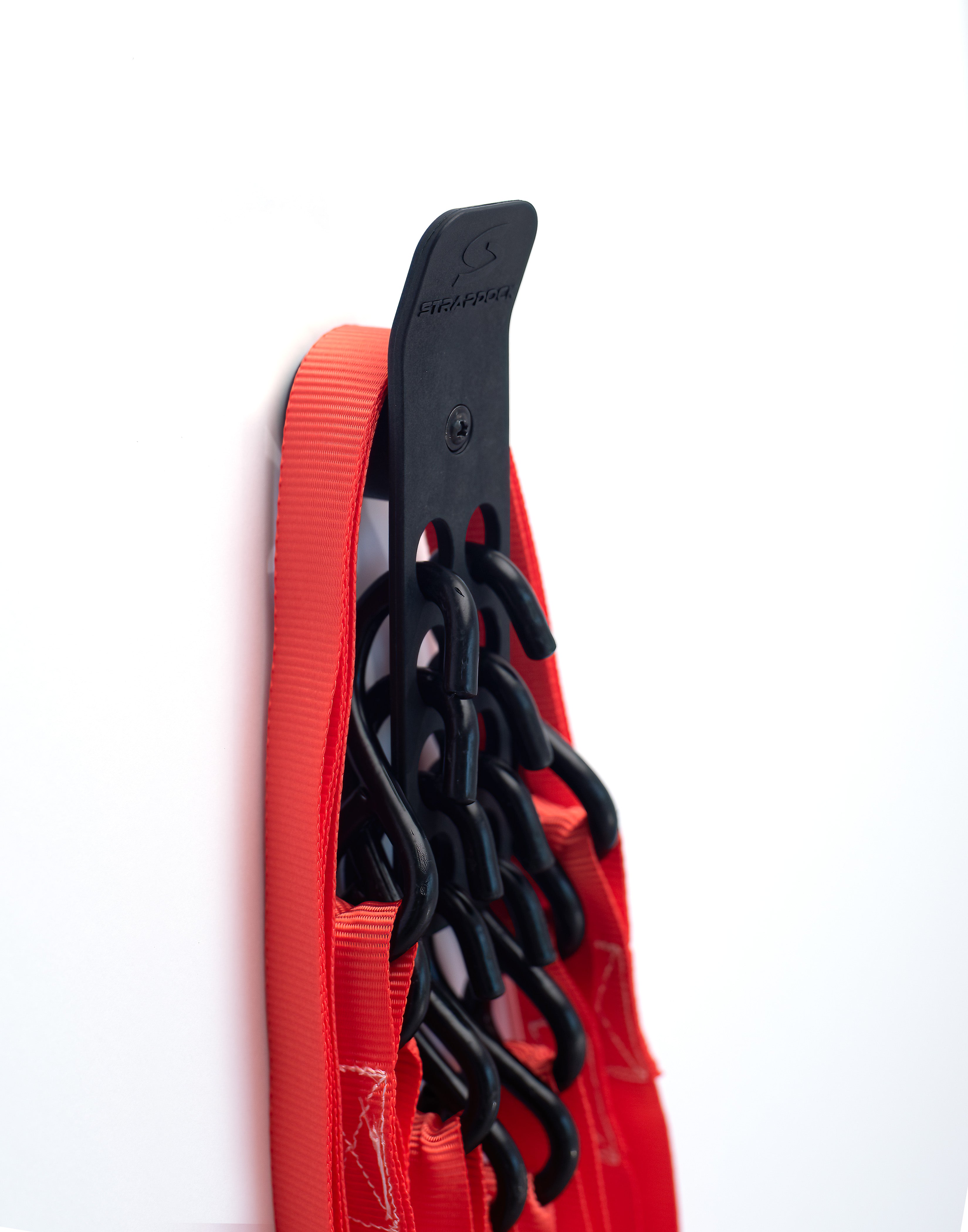 StrapDock™ – Compact Vertical Cargo Strap & Bungee Cord Organizer