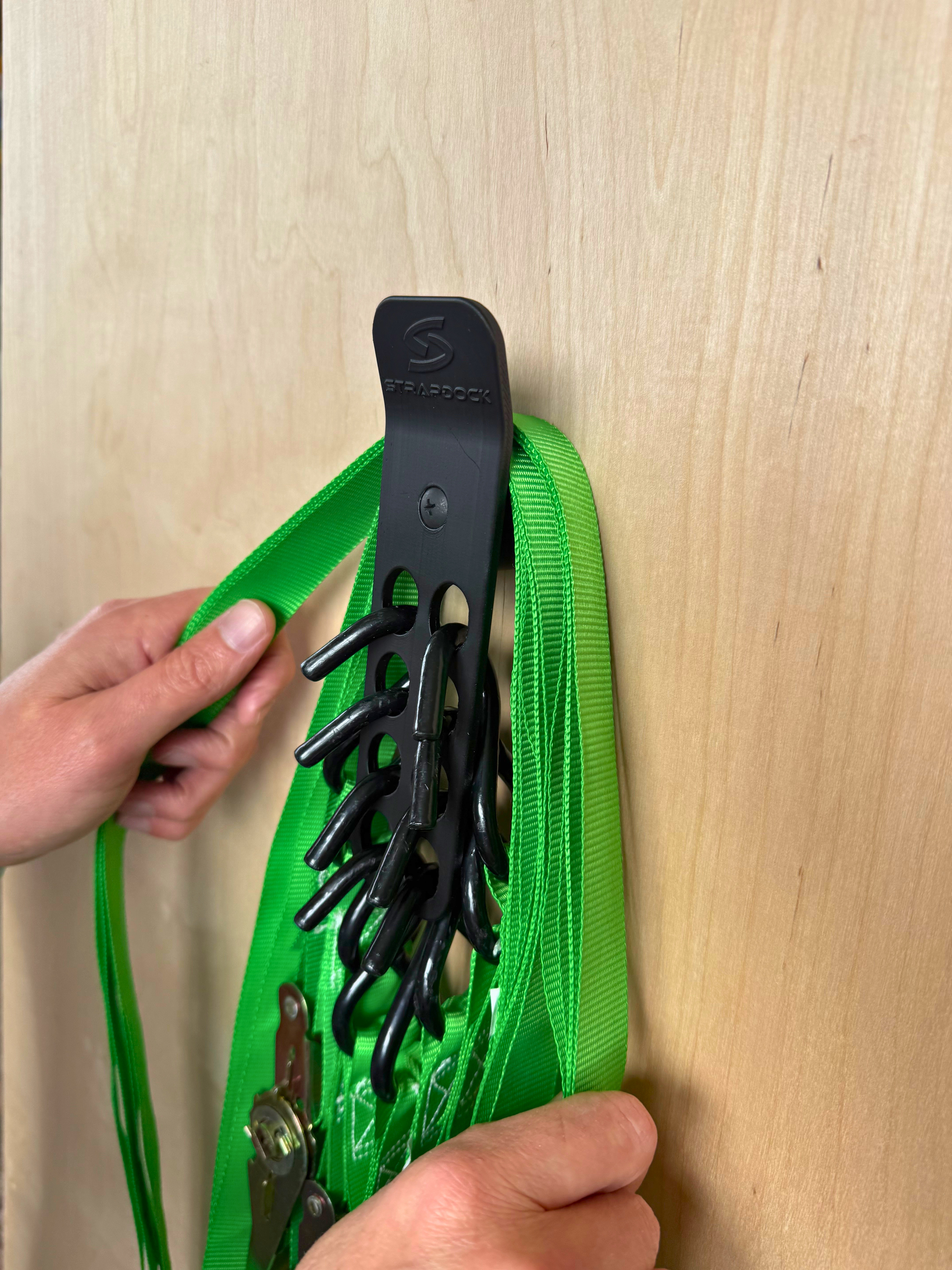StrapDock™ – Compact Vertical Cargo Strap & Bungee Cord Organizer